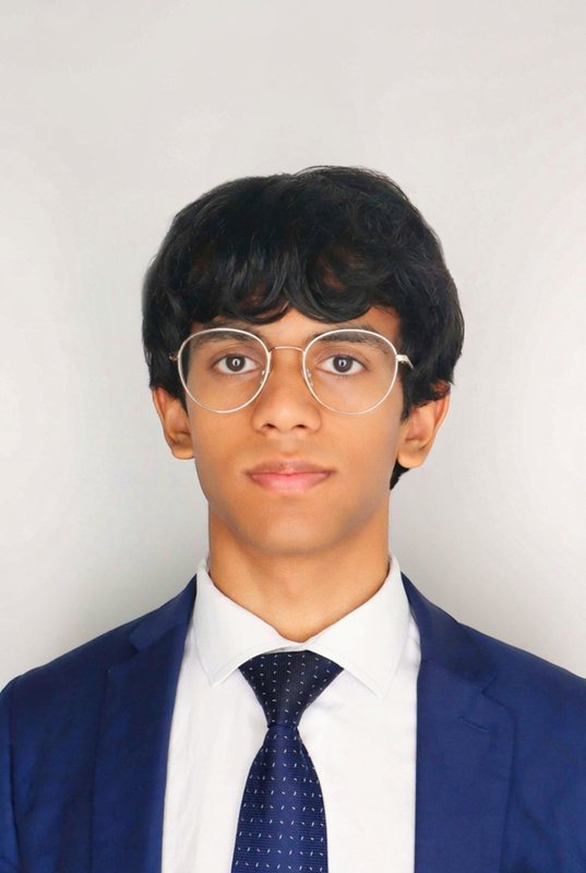 Portrait of me in a navy suit and tie